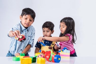 depositphotos_115373544-stock-photo-indian-kids-playing-with-block-transformed